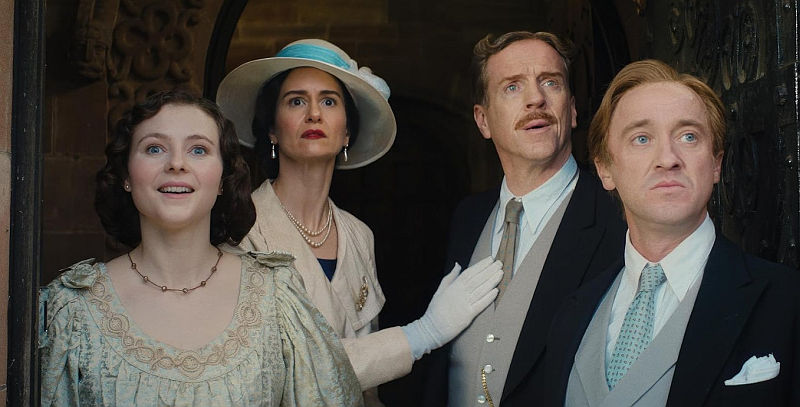 (R-L) Tom Felton, Damian Lewis, Katherine Waterston, and Thomasin McKenzie in Fackham Hall (2025)